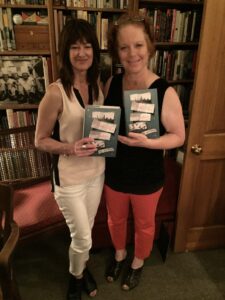 Vicki DeArmon and Janis Cooke Newman holding a book