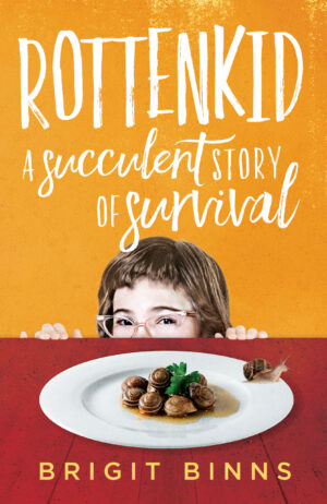 Image of Rottenkid book cover, orange with Binns hiding behind a plate of foot sat on a red dining table.